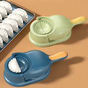 2 in 1 dumpling maker in green and blue colors, featuring a mould press tool for quick and easy dumpling creation.